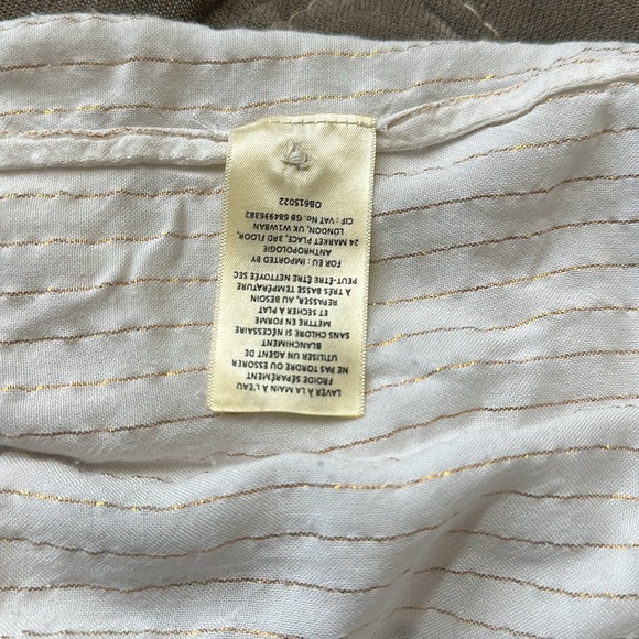 Elegant Cream Blouse with Ruffled Sleeves - Picture 9 of 9